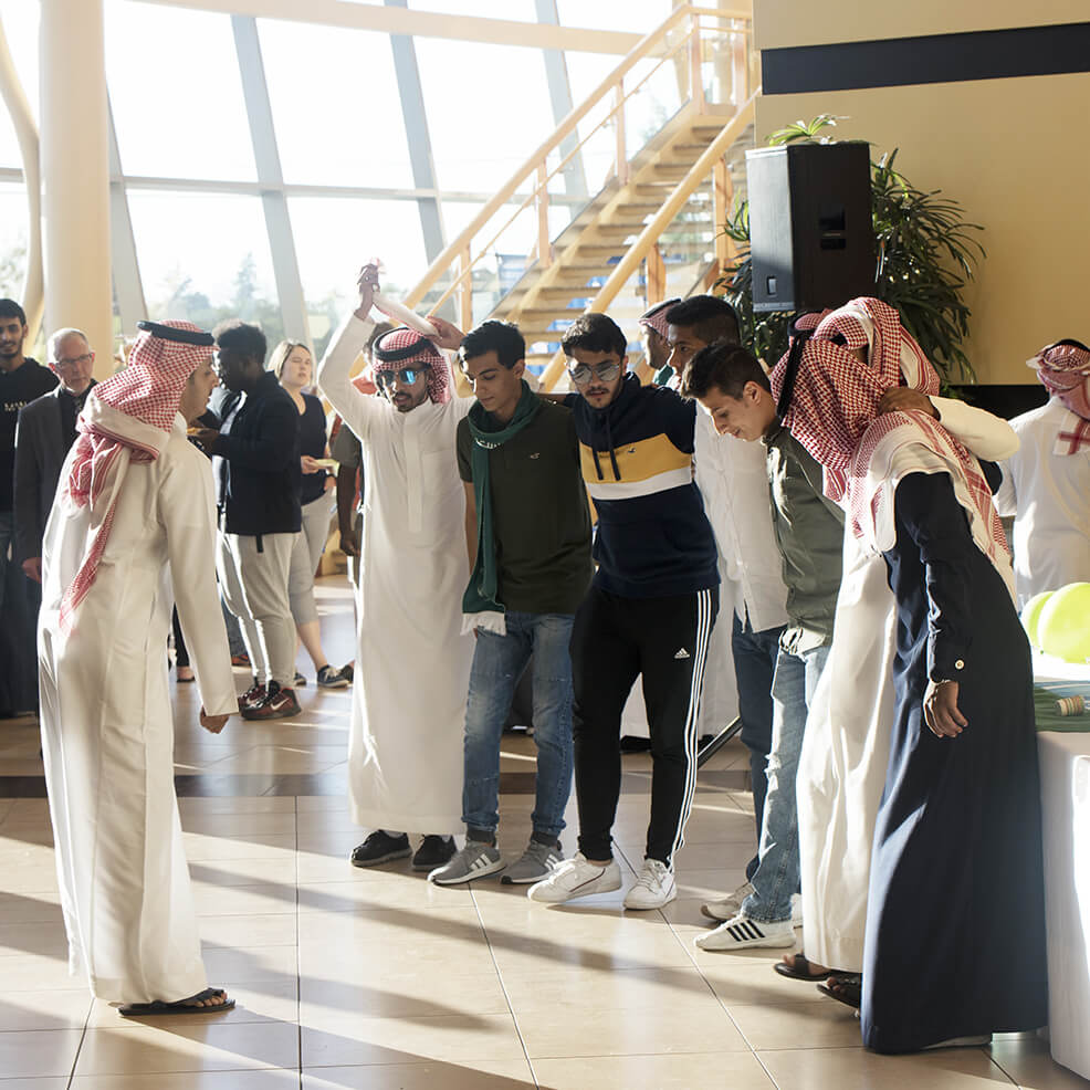 International student standing and praying